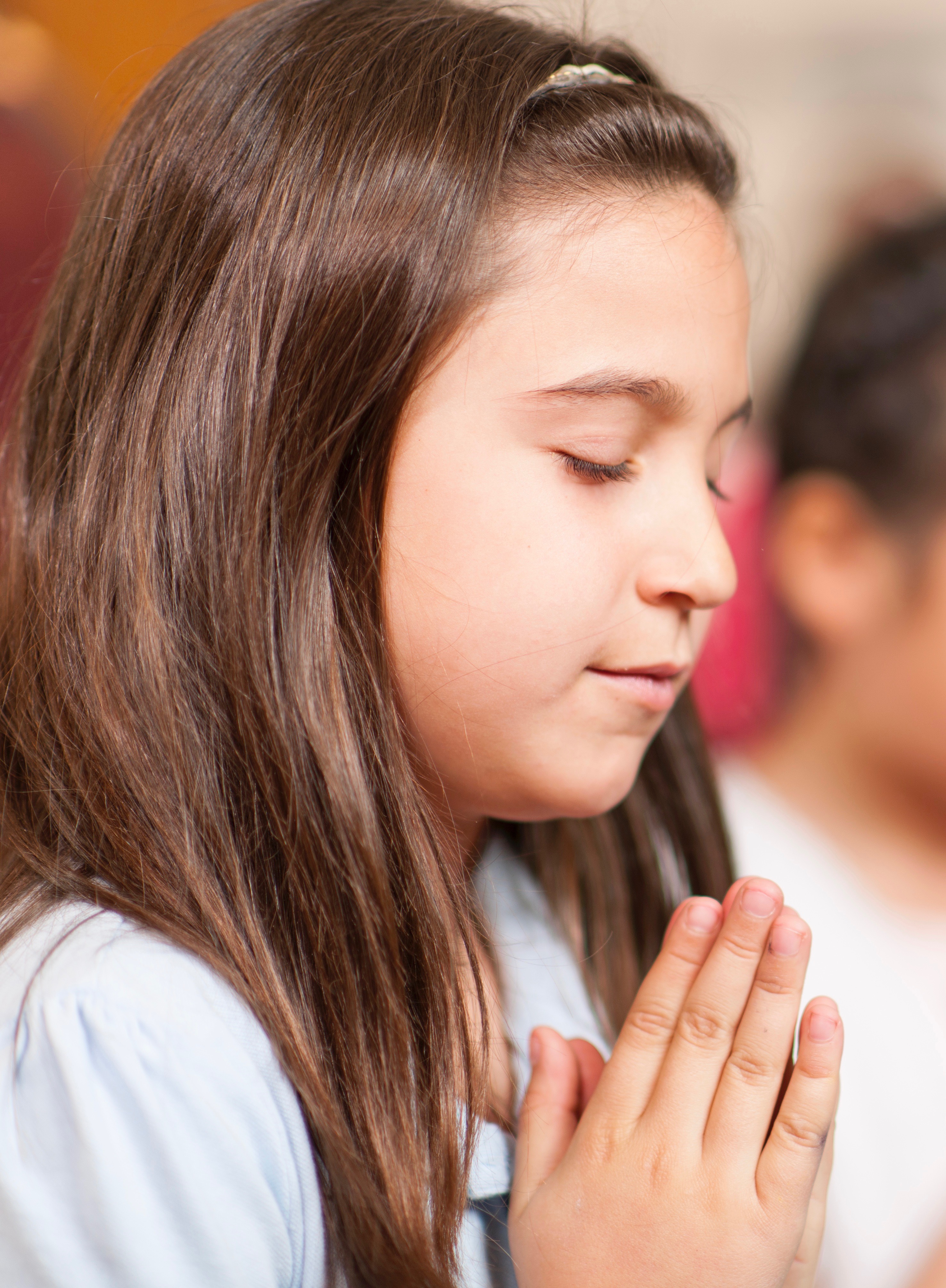 photo of girl praying