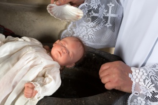 Baby at Baptism, Adobe stock